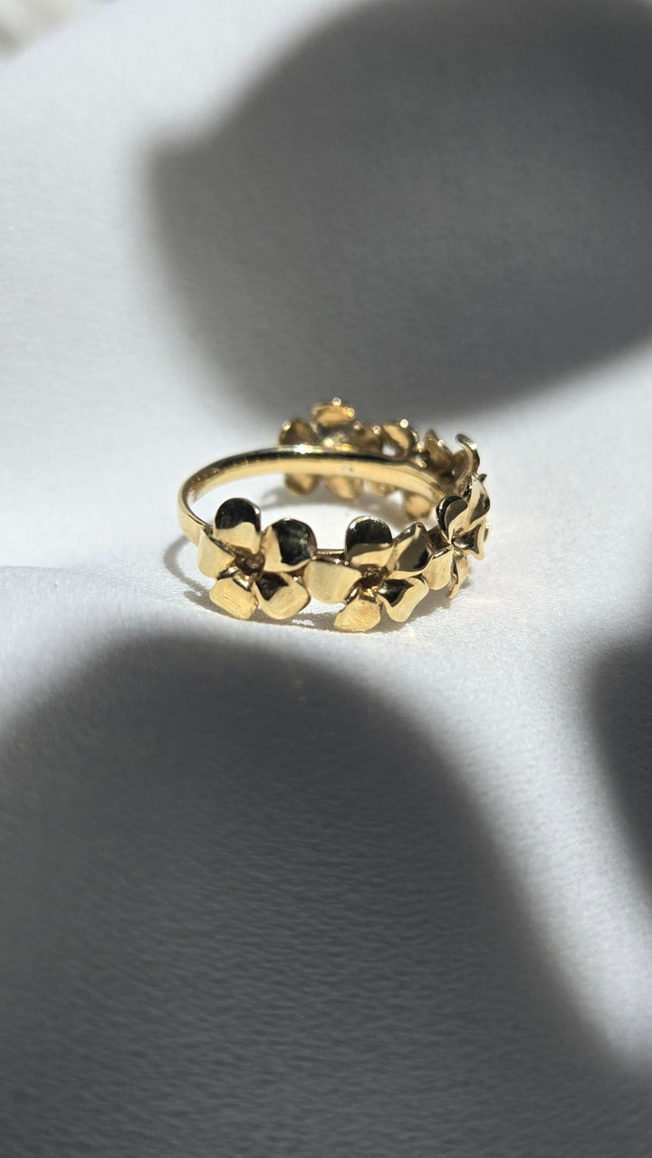 K10YG PLUMERIA HALF ETERNITY RING