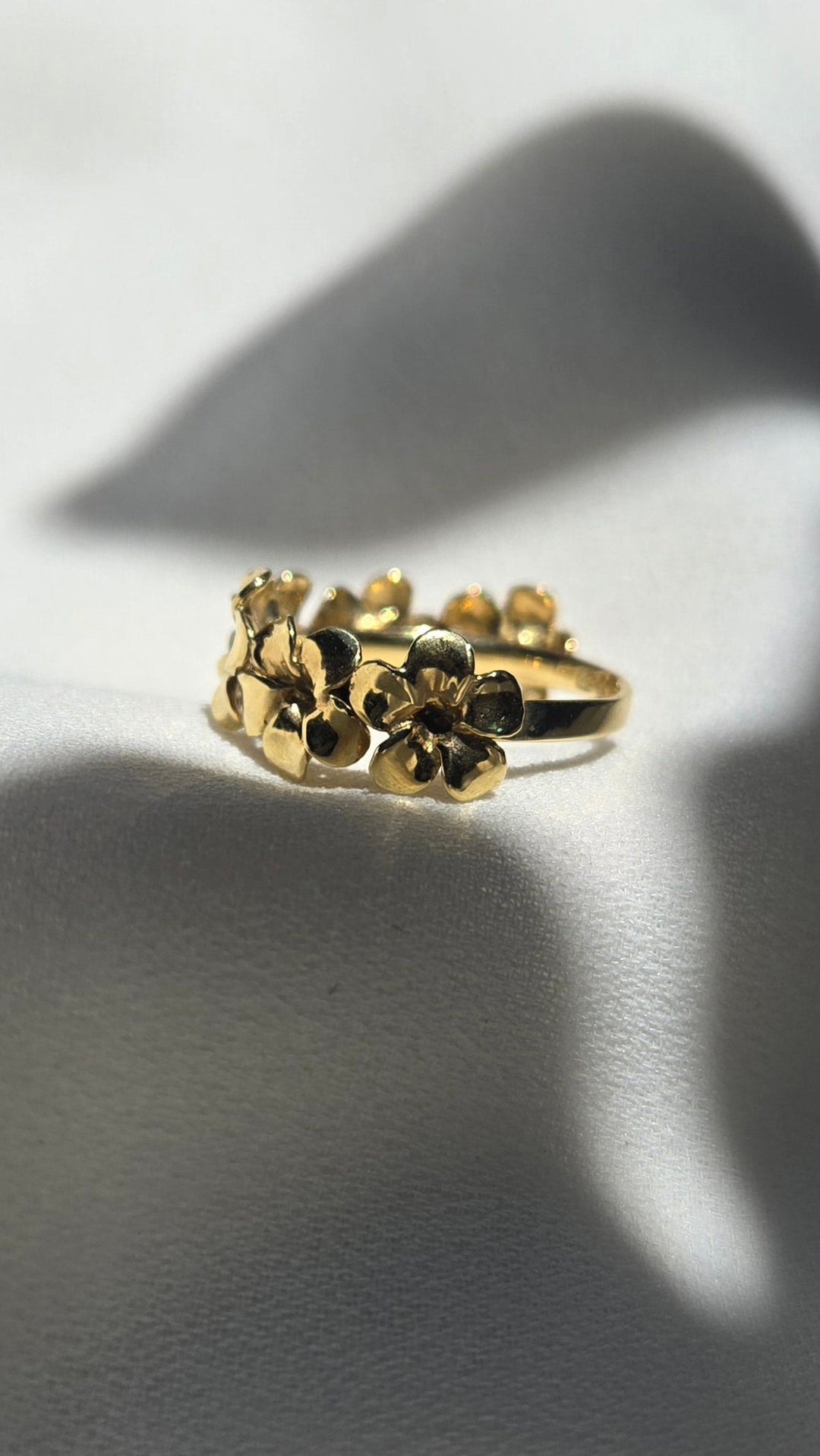 K10YG PLUMERIA HALF ETERNITY RING