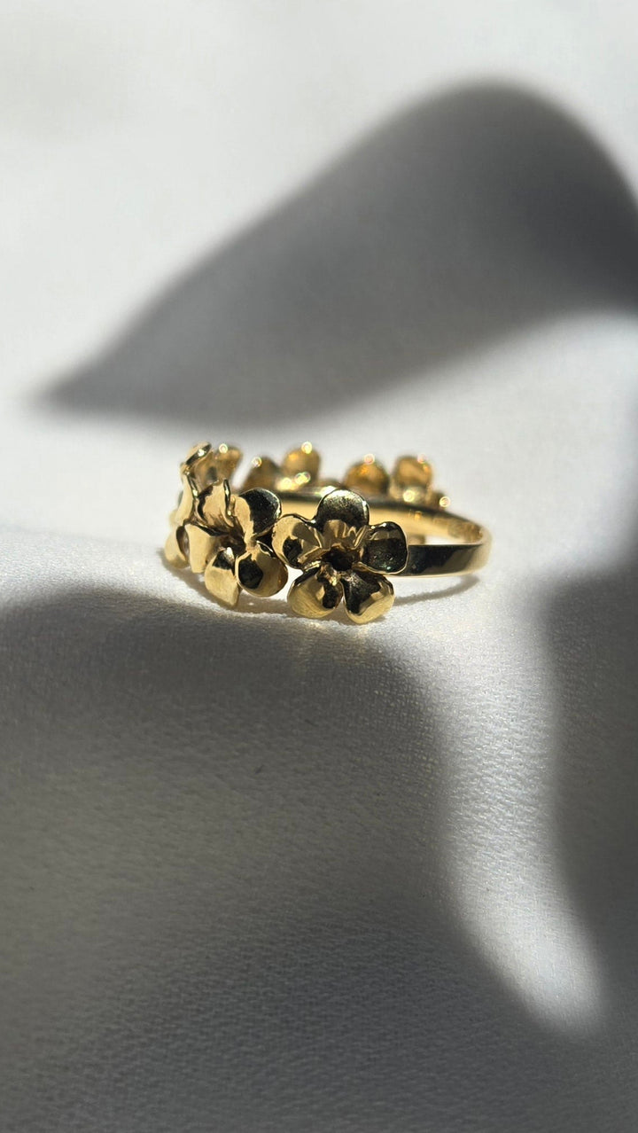 K10YG PLUMERIA HALF ETERNITY RING