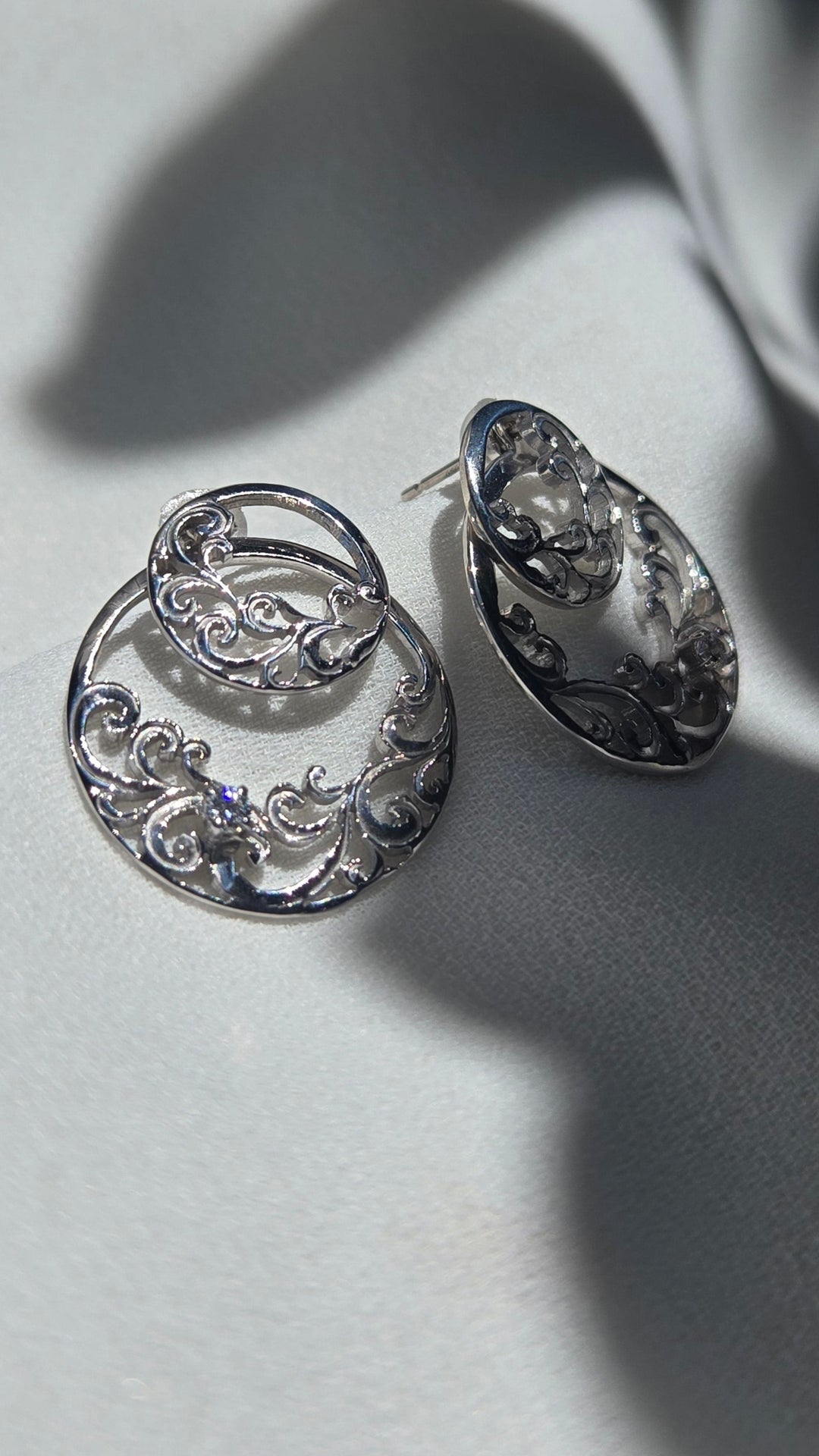 SV ROUND SKY EARRINGS