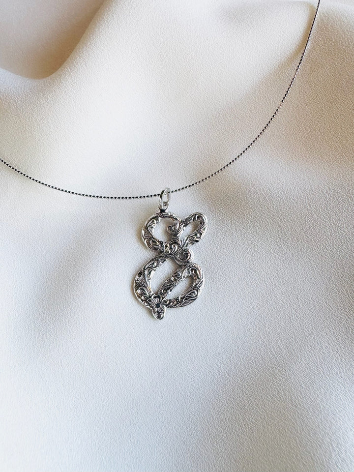 SV INITIAL SCRIPT PENDANT